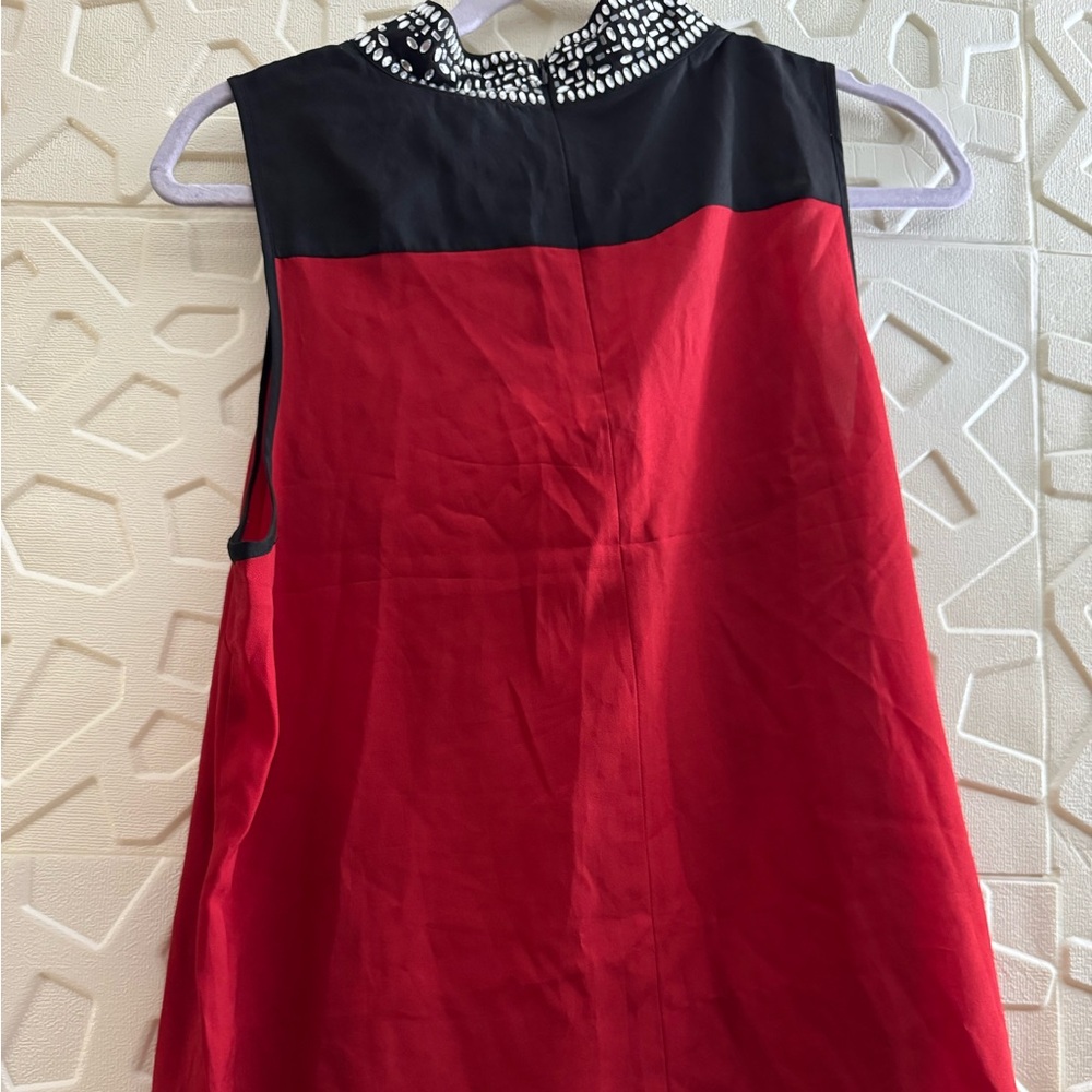 Sleeveless Red and Black blouse